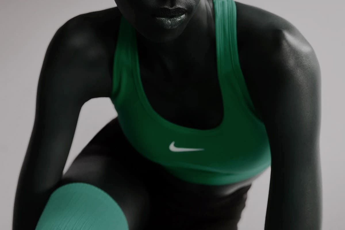 Close-up of an athlete in an emerald green Nike sports bra