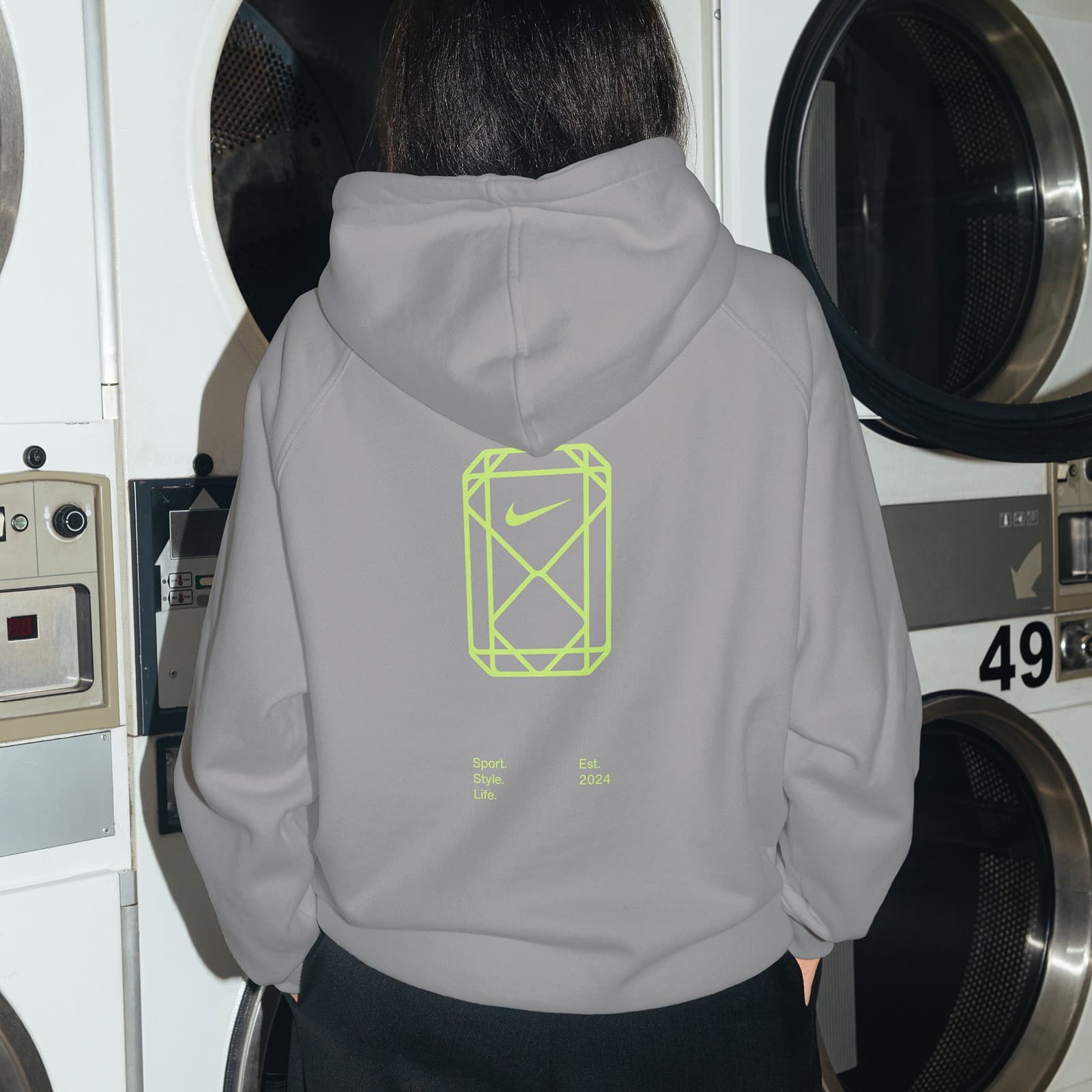 Grey hoodie with the gemstone mark on the back